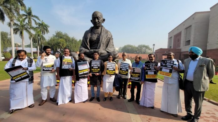 protest-gandhi-statue-parliament-2